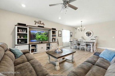 This immaculate home built in 2021 is MOVE IN READY and offers on Golf Club At South Hampton in Florida - for sale on GolfHomes.com, golf home, golf lot