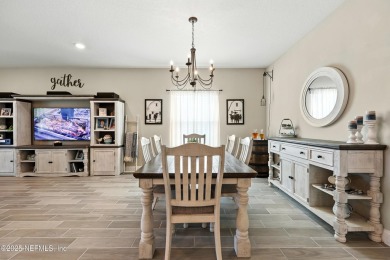 This immaculate home built in 2021 is MOVE IN READY and offers on Golf Club At South Hampton in Florida - for sale on GolfHomes.com, golf home, golf lot