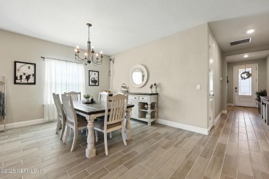 This immaculate home built in 2021 is MOVE IN READY and offers on Golf Club At South Hampton in Florida - for sale on GolfHomes.com, golf home, golf lot