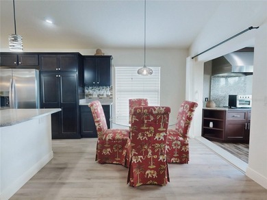 This LOVELY 3/2 IRIS Designer sits on an OVERSIZED lot with on Pennbrooke Fairways in Florida - for sale on GolfHomes.com, golf home, golf lot