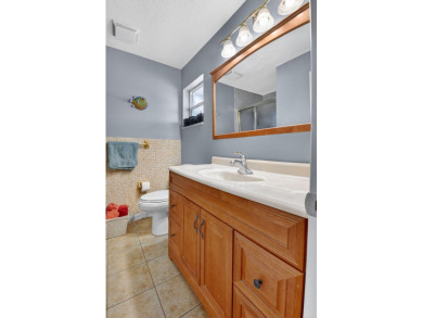 Spacious 2BR/2BA on Large Corner Lot in Leisureville! Bright and on Leisureville Community Golf Course in Florida - for sale on GolfHomes.com, golf home, golf lot