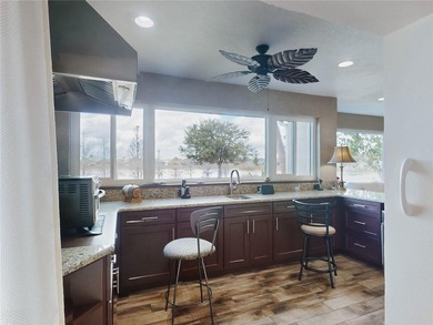 This LOVELY 3/2 IRIS Designer sits on an OVERSIZED lot with on Pennbrooke Fairways in Florida - for sale on GolfHomes.com, golf home, golf lot