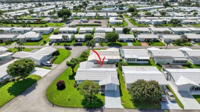 Spacious 2BR/2BA on Large Corner Lot in Leisureville! Bright and on Leisureville Community Golf Course in Florida - for sale on GolfHomes.com, golf home, golf lot