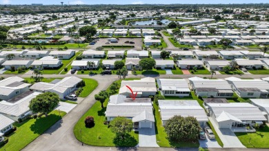Spacious 2BR/2BA on Large Corner Lot in Leisureville! Bright and on Leisureville Community Golf Course in Florida - for sale on GolfHomes.com, golf home, golf lot