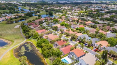 Beautifully updated LAKE FRONT 3-bed, 2-bath home in Grand on Grand Palms Hotel and Golf Resort in Florida - for sale on GolfHomes.com, golf home, golf lot