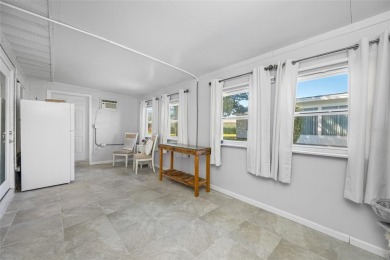 This well-maintained and tastefully updated 2-bedroom on Highland Lakes Executive Golf Course in Florida - for sale on GolfHomes.com, golf home, golf lot