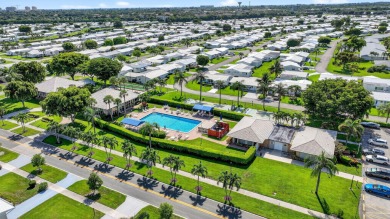 Spacious 2BR/2BA on Large Corner Lot in Leisureville! Bright and on Leisureville Community Golf Course in Florida - for sale on GolfHomes.com, golf home, golf lot