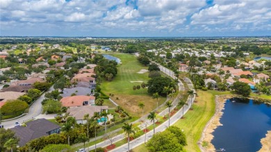 Beautifully updated LAKE FRONT 3-bed, 2-bath home in Grand on Grand Palms Hotel and Golf Resort in Florida - for sale on GolfHomes.com, golf home, golf lot
