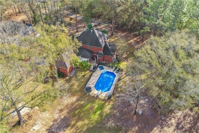 Do you want privacy and a stunning view? This beautiful home may on Mill Creek Golf Course in Alabama - for sale on GolfHomes.com, golf home, golf lot