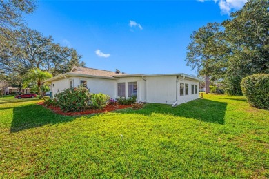 This well-maintained and tastefully updated 2-bedroom on Highland Lakes Executive Golf Course in Florida - for sale on GolfHomes.com, golf home, golf lot