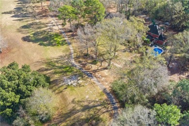 Do you want privacy and a stunning view? This beautiful home may on Mill Creek Golf Course in Alabama - for sale on GolfHomes.com, golf home, golf lot