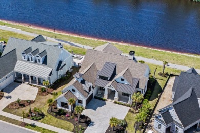 This exquisite, 4 bedroom, 4 bath one-of-a-kind former model on Grande Dunes Golf Club in South Carolina - for sale on GolfHomes.com, golf home, golf lot