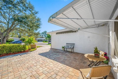 This well-maintained and tastefully updated 2-bedroom on Highland Lakes Executive Golf Course in Florida - for sale on GolfHomes.com, golf home, golf lot