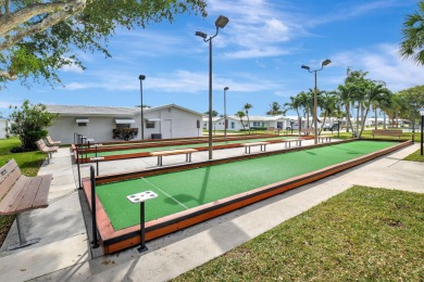 Spacious 2BR/2BA on Large Corner Lot in Leisureville! Bright and on Leisureville Community Golf Course in Florida - for sale on GolfHomes.com, golf home, golf lot