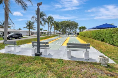 Spacious 2BR/2BA on Large Corner Lot in Leisureville! Bright and on Leisureville Community Golf Course in Florida - for sale on GolfHomes.com, golf home, golf lot