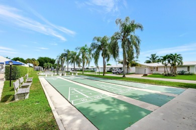 Spacious 2BR/2BA on Large Corner Lot in Leisureville! Bright and on Leisureville Community Golf Course in Florida - for sale on GolfHomes.com, golf home, golf lot