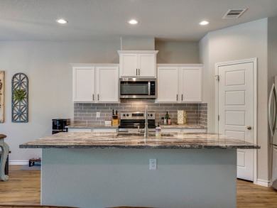 Beautiful one-story Blanco Valley Home tucked back in the gated on Vaaler Creek Golf Club in Texas - for sale on GolfHomes.com, golf home, golf lot