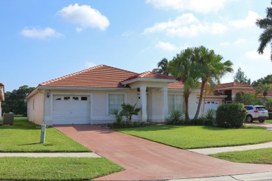 Nestled in the prestigious Atlantic National Golf and Country on Atlantic National Golf and Country Club in Florida - for sale on GolfHomes.com, golf home, golf lot