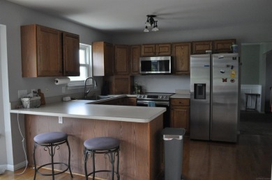 Motivated Seller Priced to move.  Newer roof, outside paint on Copper Ridge Golf Club in Michigan - for sale on GolfHomes.com, golf home, golf lot