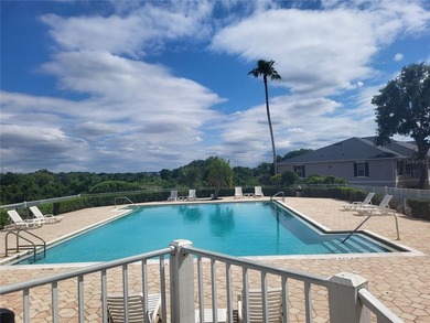 Beautiful Corner Unit in Southern Dunes Condominiums - This on Southern Dunes Golf and Country Club in Florida - for sale on GolfHomes.com, golf home, golf lot