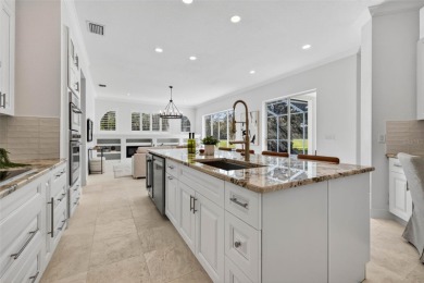 Experience resort-style living in this beautifully upgraded 5 on Lexington Oaks Golf Club in Florida - for sale on GolfHomes.com, golf home, golf lot