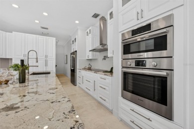 Experience resort-style living in this beautifully upgraded 5 on Lexington Oaks Golf Club in Florida - for sale on GolfHomes.com, golf home, golf lot