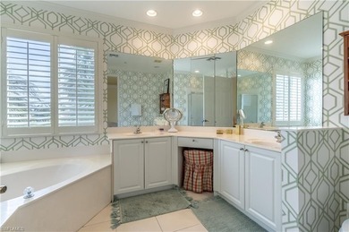 Tucked away in the heart of Pelican Marsh, this beautifully on Pelican Marsh Golf Club in Florida - for sale on GolfHomes.com, golf home, golf lot