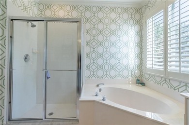 Tucked away in the heart of Pelican Marsh, this beautifully on Pelican Marsh Golf Club in Florida - for sale on GolfHomes.com, golf home, golf lot