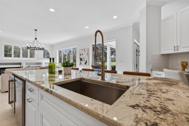 Experience resort-style living in this beautifully upgraded 5 on Lexington Oaks Golf Club in Florida - for sale on GolfHomes.com, golf home, golf lot