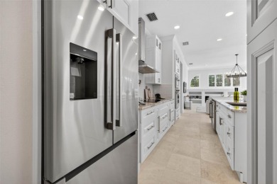 Experience resort-style living in this beautifully upgraded 5 on Lexington Oaks Golf Club in Florida - for sale on GolfHomes.com, golf home, golf lot