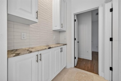 Experience resort-style living in this beautifully upgraded 5 on Lexington Oaks Golf Club in Florida - for sale on GolfHomes.com, golf home, golf lot