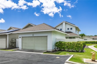 The spacious primary bedroom is on the main level. This is on Hoakalei Country Club At Ocean Pointe in Hawaii - for sale on GolfHomes.com, golf home, golf lot