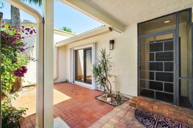Sun-filled 2-bedroom villa with views of the golf course on Hunters Run Golf and Country Club in Florida - for sale on GolfHomes.com, golf home, golf lot