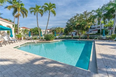Tucked away in the heart of Pelican Marsh, this beautifully on Pelican Marsh Golf Club in Florida - for sale on GolfHomes.com, golf home, golf lot