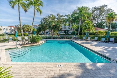 Tucked away in the heart of Pelican Marsh, this beautifully on Pelican Marsh Golf Club in Florida - for sale on GolfHomes.com, golf home, golf lot
