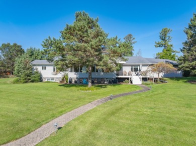 Mint condition 4 bedroom, 5 bath home on the Eagle River /Three on Eagle River Golf Course in Wisconsin - for sale on GolfHomes.com, golf home, golf lot