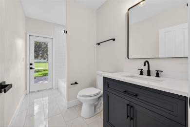 Experience resort-style living in this beautifully upgraded 5 on Lexington Oaks Golf Club in Florida - for sale on GolfHomes.com, golf home, golf lot