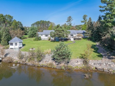 Mint condition 4 bedroom, 5 bath home on the Eagle River /Three on Eagle River Golf Course in Wisconsin - for sale on GolfHomes.com, golf home, golf lot