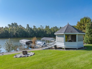 Mint condition 4 bedroom, 5 bath home on the Eagle River /Three on Eagle River Golf Course in Wisconsin - for sale on GolfHomes.com, golf home, golf lot