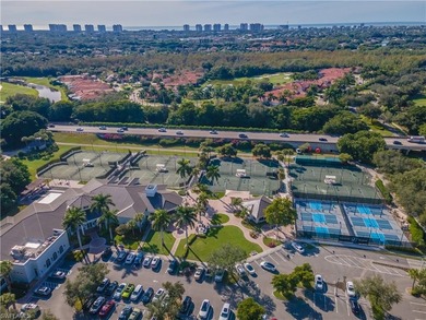 Tucked away in the heart of Pelican Marsh, this beautifully on Pelican Marsh Golf Club in Florida - for sale on GolfHomes.com, golf home, golf lot