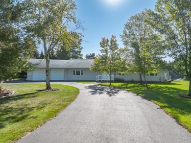 Mint condition 4 bedroom, 5 bath home on the Eagle River /Three on Eagle River Golf Course in Wisconsin - for sale on GolfHomes.com, golf home, golf lot