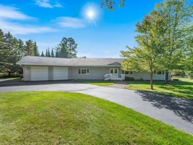 Mint condition 4 bedroom, 5 bath home on the Eagle River /Three on Eagle River Golf Course in Wisconsin - for sale on GolfHomes.com, golf home, golf lot