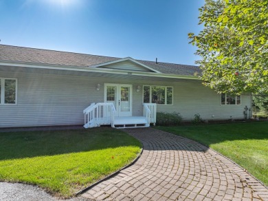 Mint condition 4 bedroom, 5 bath home on the Eagle River /Three on Eagle River Golf Course in Wisconsin - for sale on GolfHomes.com, golf home, golf lot