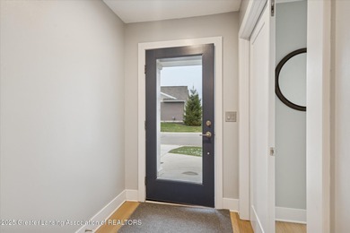 This 2 bed/2 bath home offers an open floor plan with energy on Eagle Eye Golf Club in Michigan - for sale on GolfHomes.com, golf home, golf lot