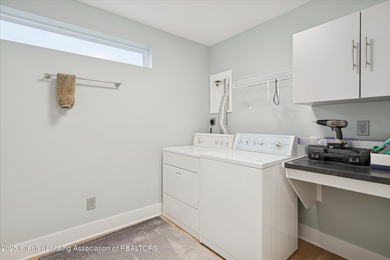 This 2 bed/2 bath home offers an open floor plan with energy on Eagle Eye Golf Club in Michigan - for sale on GolfHomes.com, golf home, golf lot