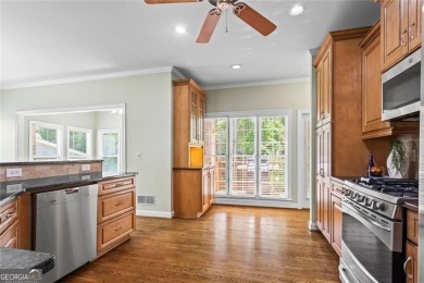Easy Living in The Spinnakers of Windward! Downsize without on The Golf Club of Georgia in Georgia - for sale on GolfHomes.com, golf home, golf lot