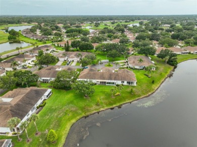 Waterfront Beauty nestled within a cul-de-sac in Kings Point - on Scepter Golf Club in Florida - for sale on GolfHomes.com, golf home, golf lot