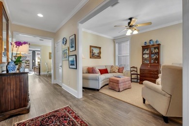 Sitting gracefully on a hilltop corner lot across from the on Southwood Golf Club in Florida - for sale on GolfHomes.com, golf home, golf lot