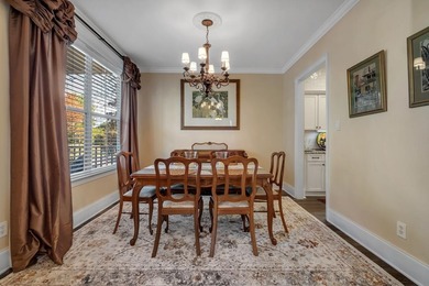 Sitting gracefully on a hilltop corner lot across from the on Southwood Golf Club in Florida - for sale on GolfHomes.com, golf home, golf lot