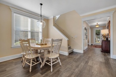 Sitting gracefully on a hilltop corner lot across from the on Southwood Golf Club in Florida - for sale on GolfHomes.com, golf home, golf lot